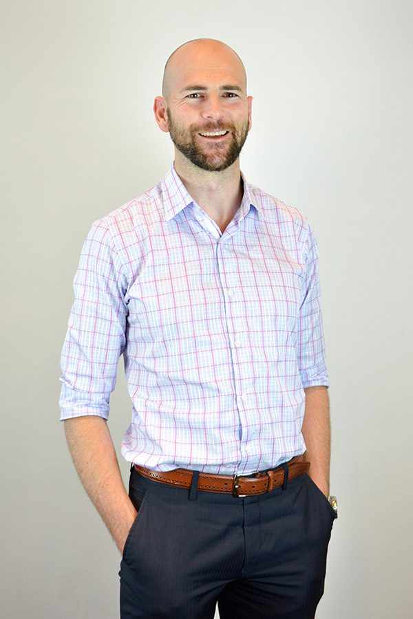 Bearded bald man smiling